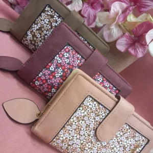 Carteras con cremallera y Brioche.Multiples departamentos.